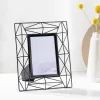 Rama foto metalica Navaris, 24x19 cm, design 3D, pentru poze 10x15, negru, MDF/sticla/metal